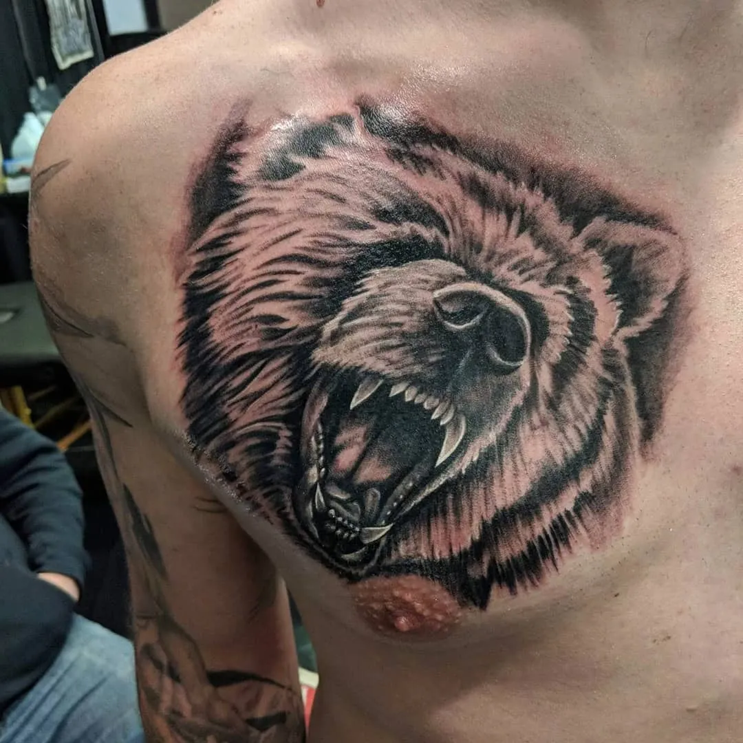 black & grey realism tattoo by TJ Cornelius at Fallen Raven Tattoo Studio in Simpsonville, SC