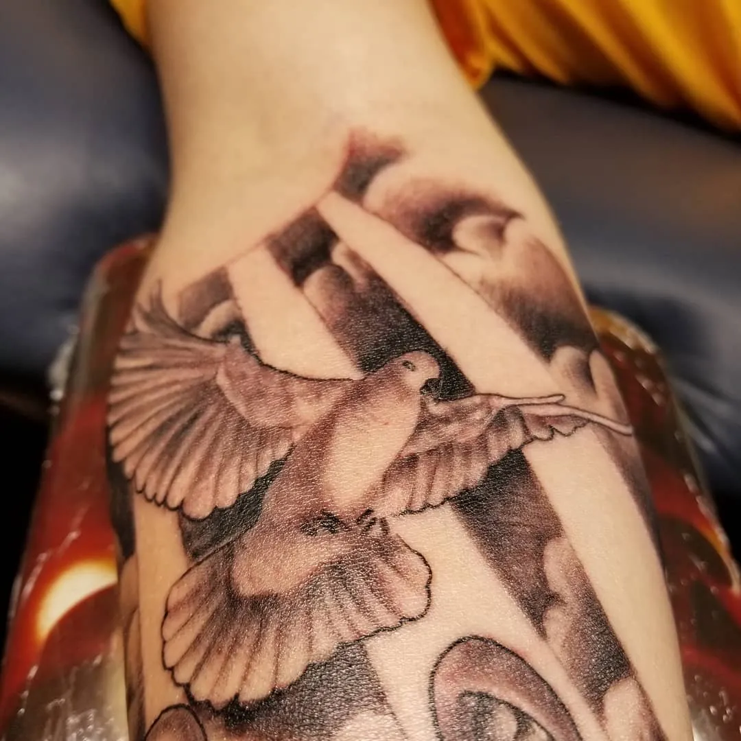 black & grey realism tattoo by Pete Delia at Fallen Raven Tattoo Studio in Simpsonville, SC