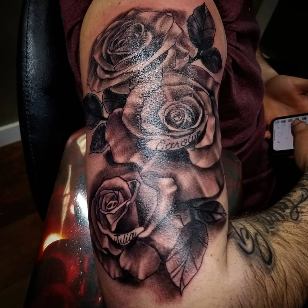 black & grey realism tattoo by Pete Delia at Fallen Raven Tattoo Studio in Simpsonville, SC