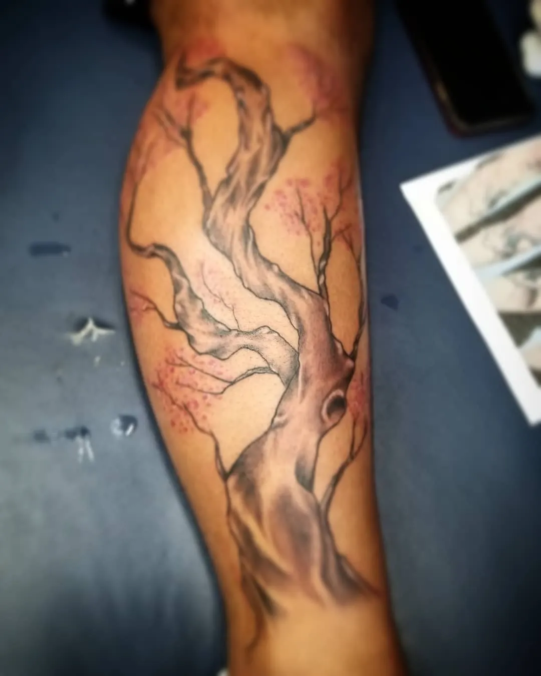 black & grey realism tattoo by Pete Delia at Fallen Raven Tattoo Studio in Simpsonville, SC