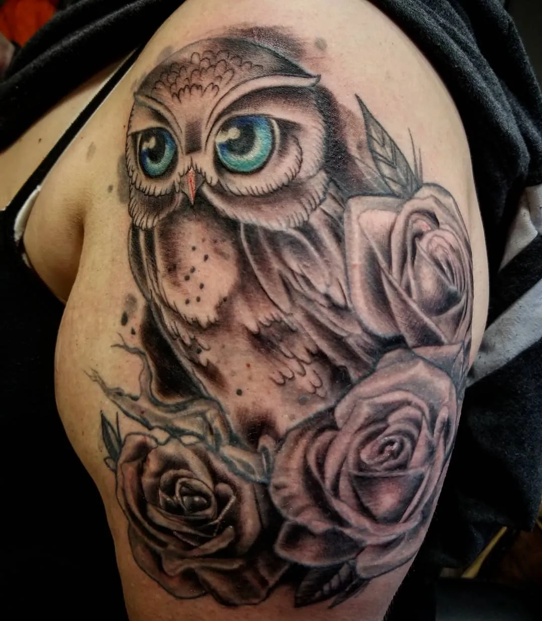 black & grey realism tattoo by Pete Delia at Fallen Raven Tattoo Studio in Simpsonville, SC