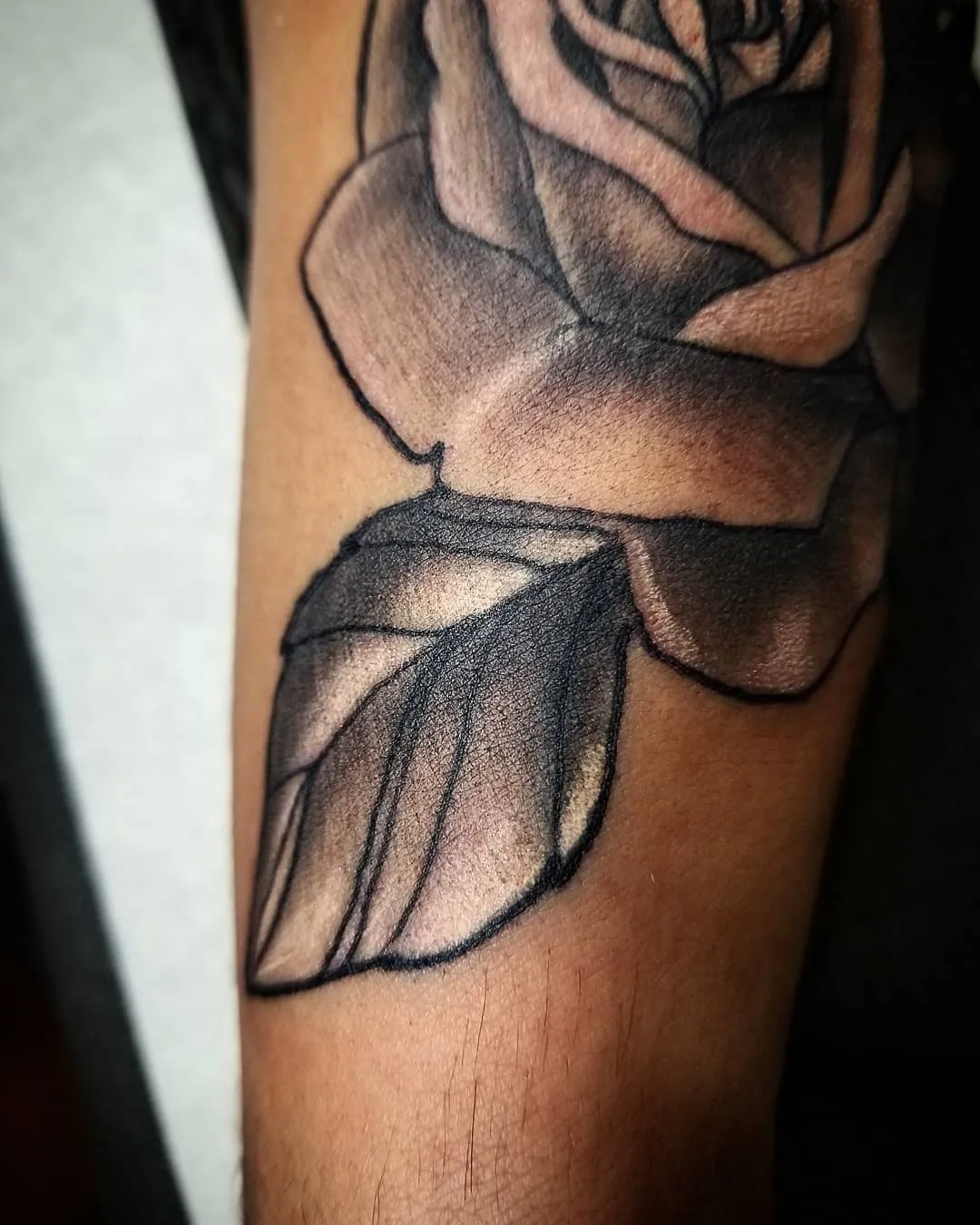 black & grey realism tattoo by Pete Delia at Fallen Raven Tattoo Studio in Simpsonville, SC