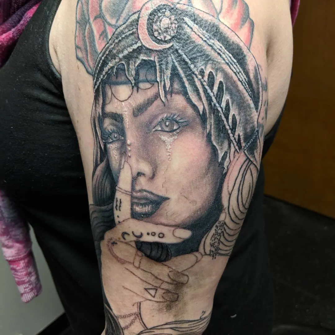 black & grey realism tattoo by TJ Cornelius at Fallen Raven Tattoo Studio in Simpsonville, SC