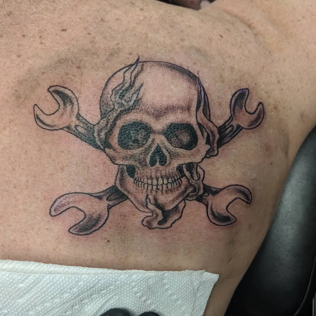 black & grey realism tattoo by TJ Cornelius at Fallen Raven Tattoo Studio in Simpsonville, SC
