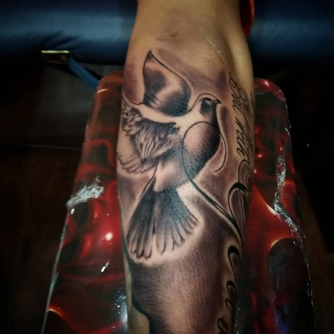 black & grey realism tattoo by Pete Delia at Fallen Raven Tattoo Studio in Simpsonville, SC