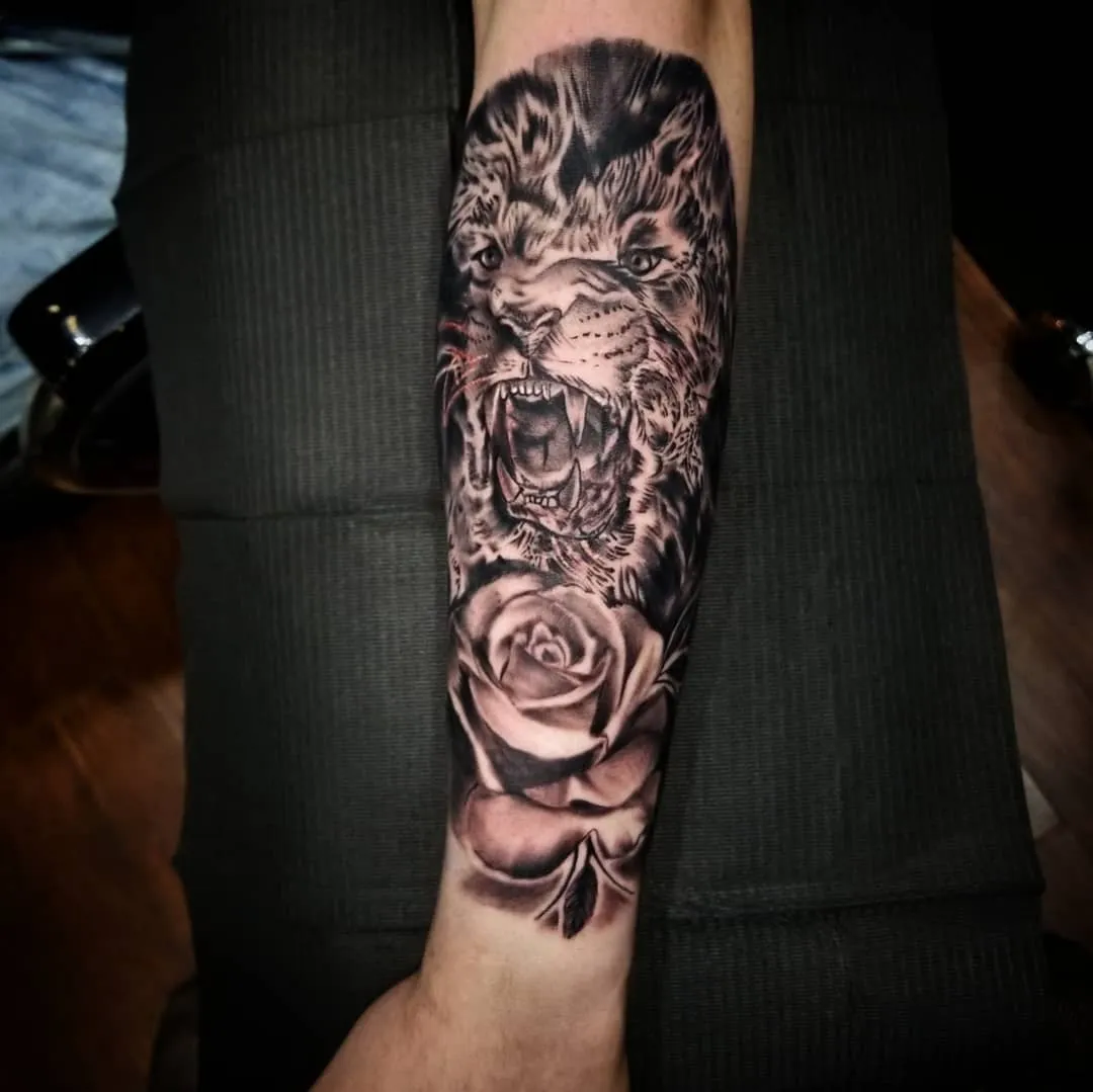 black & grey realism tattoo by Pete Delia at Fallen Raven Tattoo Studio in Simpsonville, SC