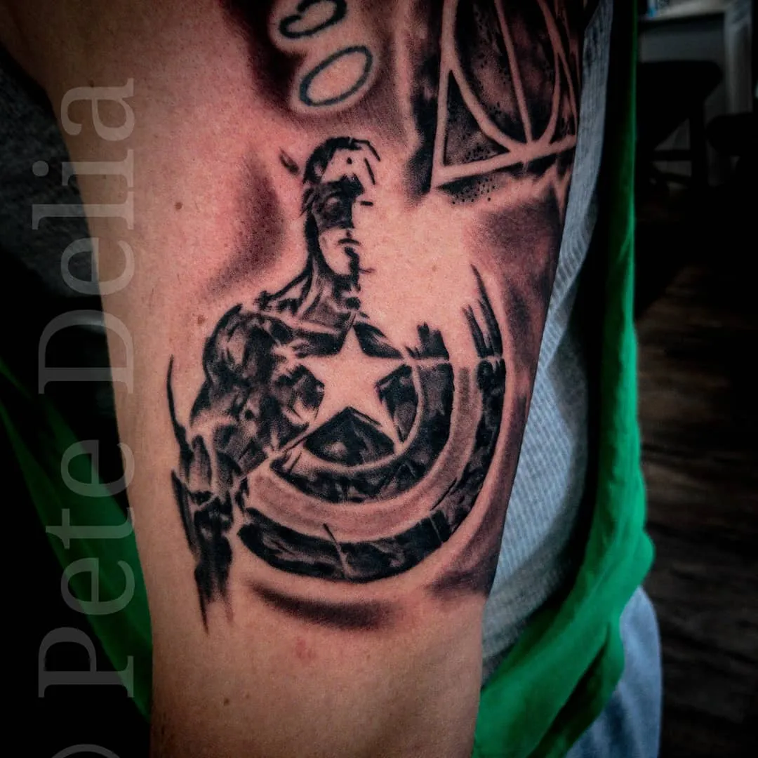 black & grey realism tattoo by Pete Delia at Fallen Raven Tattoo Studio in Simpsonville, SC