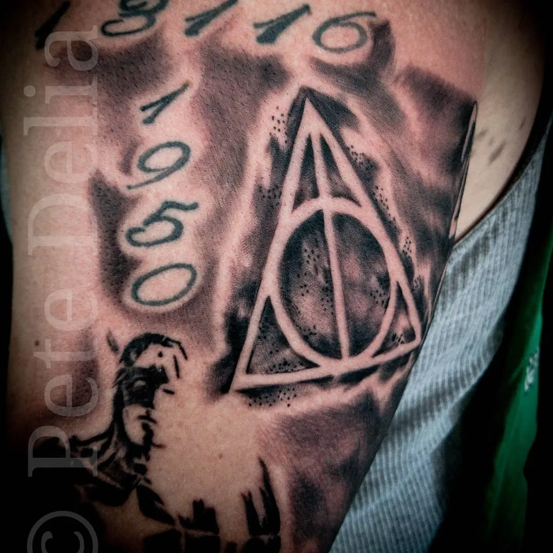 black & grey realism tattoo by Pete Delia at Fallen Raven Tattoo Studio in Simpsonville, SC