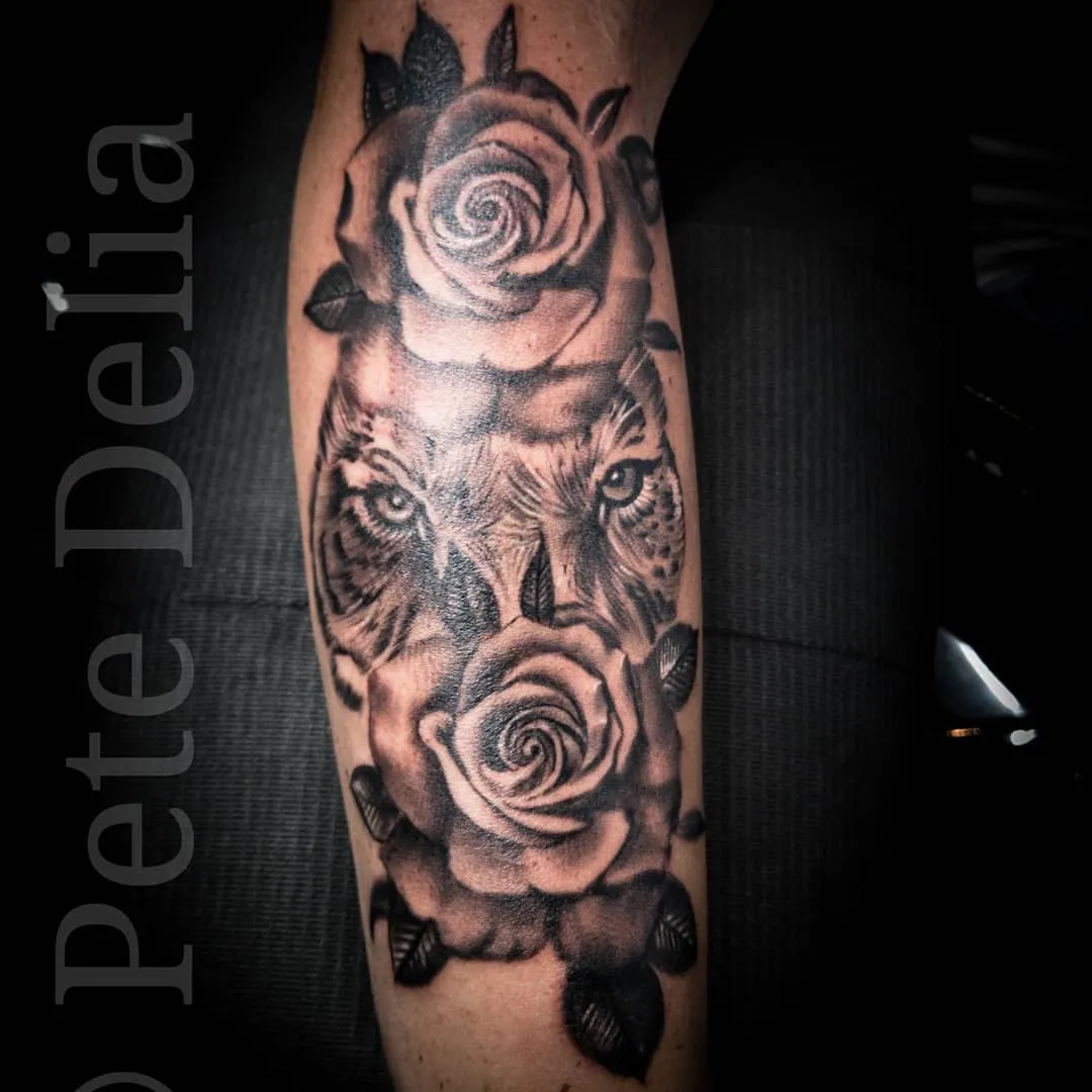 black & grey realism tattoo by Pete Delia at Fallen Raven Tattoo Studio in Simpsonville, SC