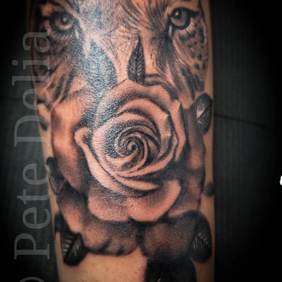 black & grey realism tattoo by Pete Delia at Fallen Raven Tattoo Studio in Simpsonville, SC
