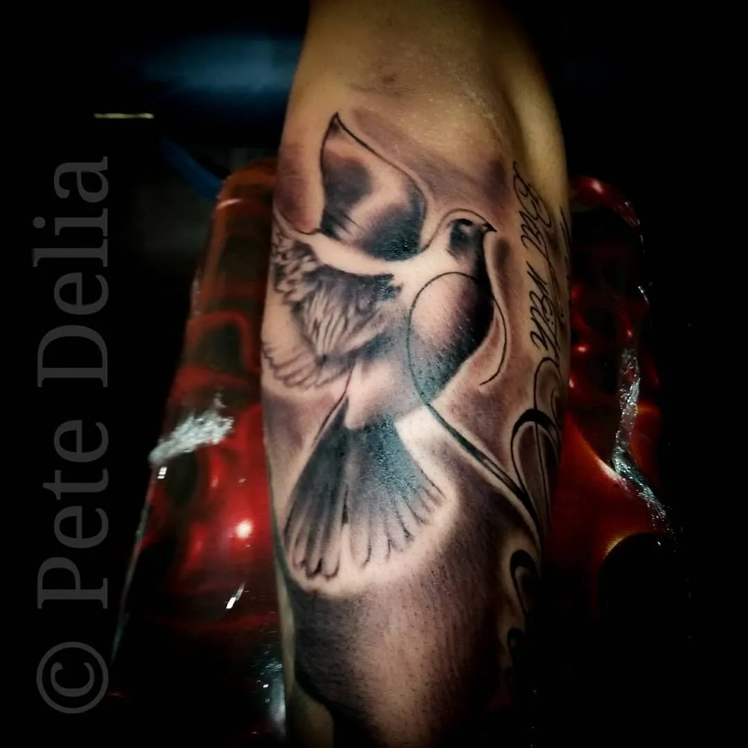 black & grey realism tattoo by Pete Delia at Fallen Raven Tattoo Studio in Simpsonville, SC