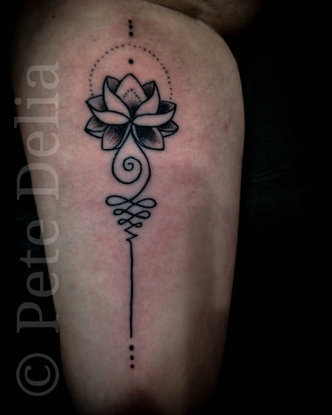 black & grey realism tattoo by Pete Delia at Fallen Raven Tattoo Studio in Simpsonville, SC