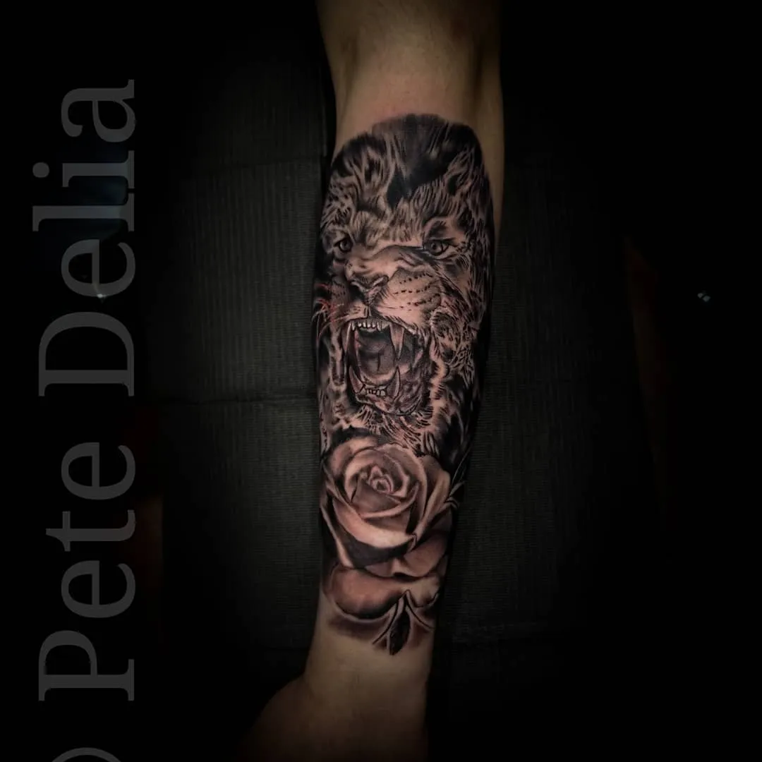 black & grey realism tattoo by Pete Delia at Fallen Raven Tattoo Studio in Simpsonville, SC