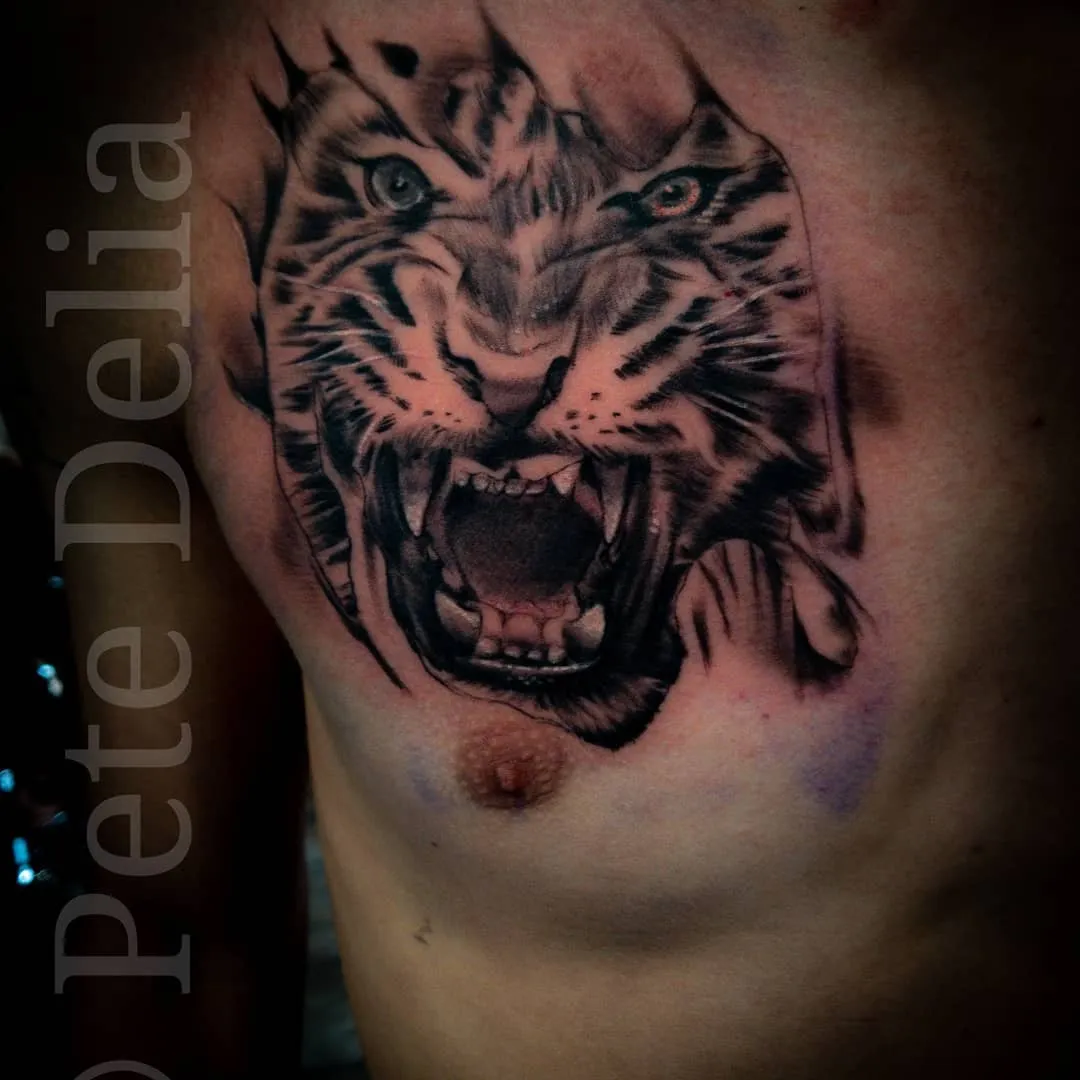 black & grey realism tattoo by Pete Delia at Fallen Raven Tattoo Studio in Simpsonville, SC