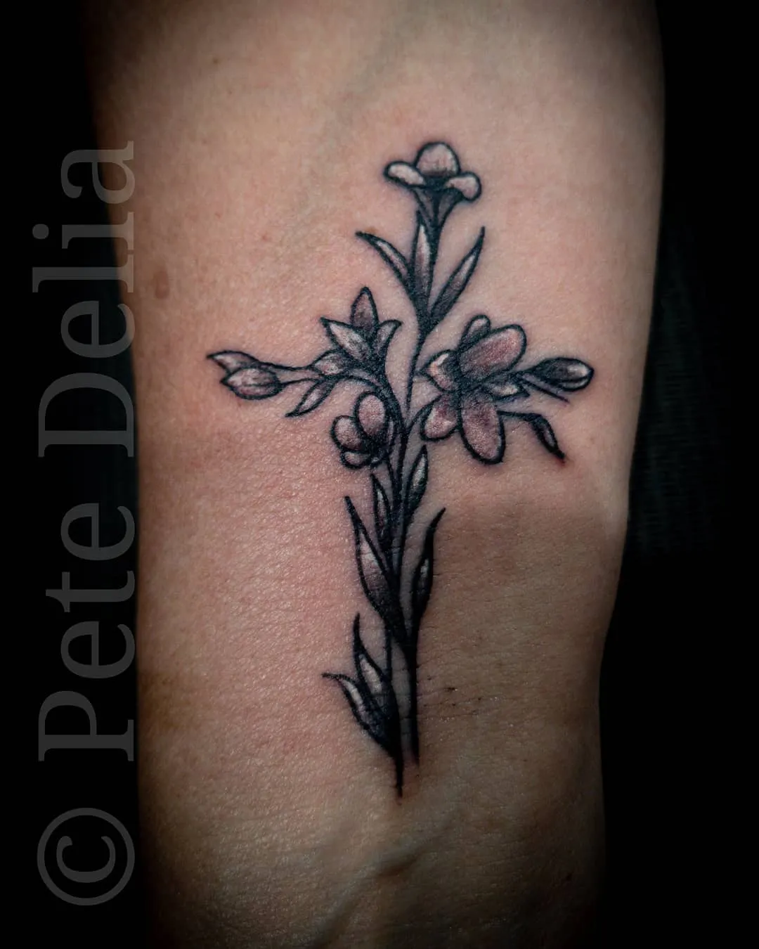 black & grey realism tattoo by Pete Delia at Fallen Raven Tattoo Studio in Simpsonville, SC