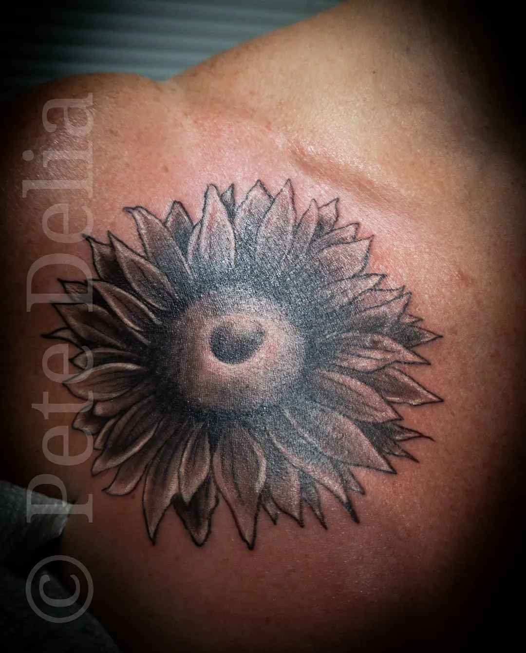 black & grey realism tattoo by Pete Delia at Fallen Raven Tattoo Studio in Simpsonville, SC