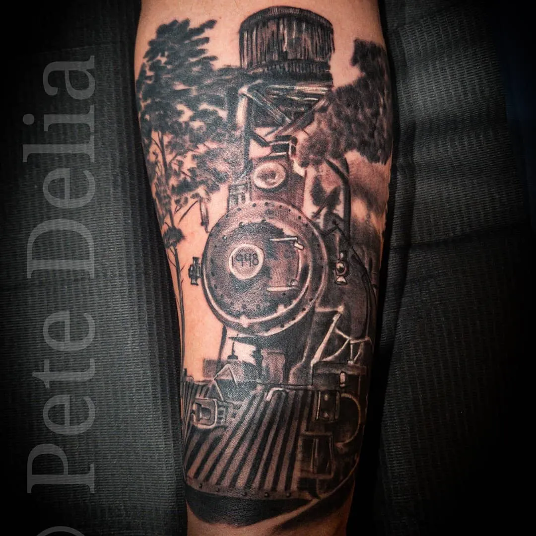 black & grey realism tattoo by Pete Delia at Fallen Raven Tattoo Studio in Simpsonville, SC