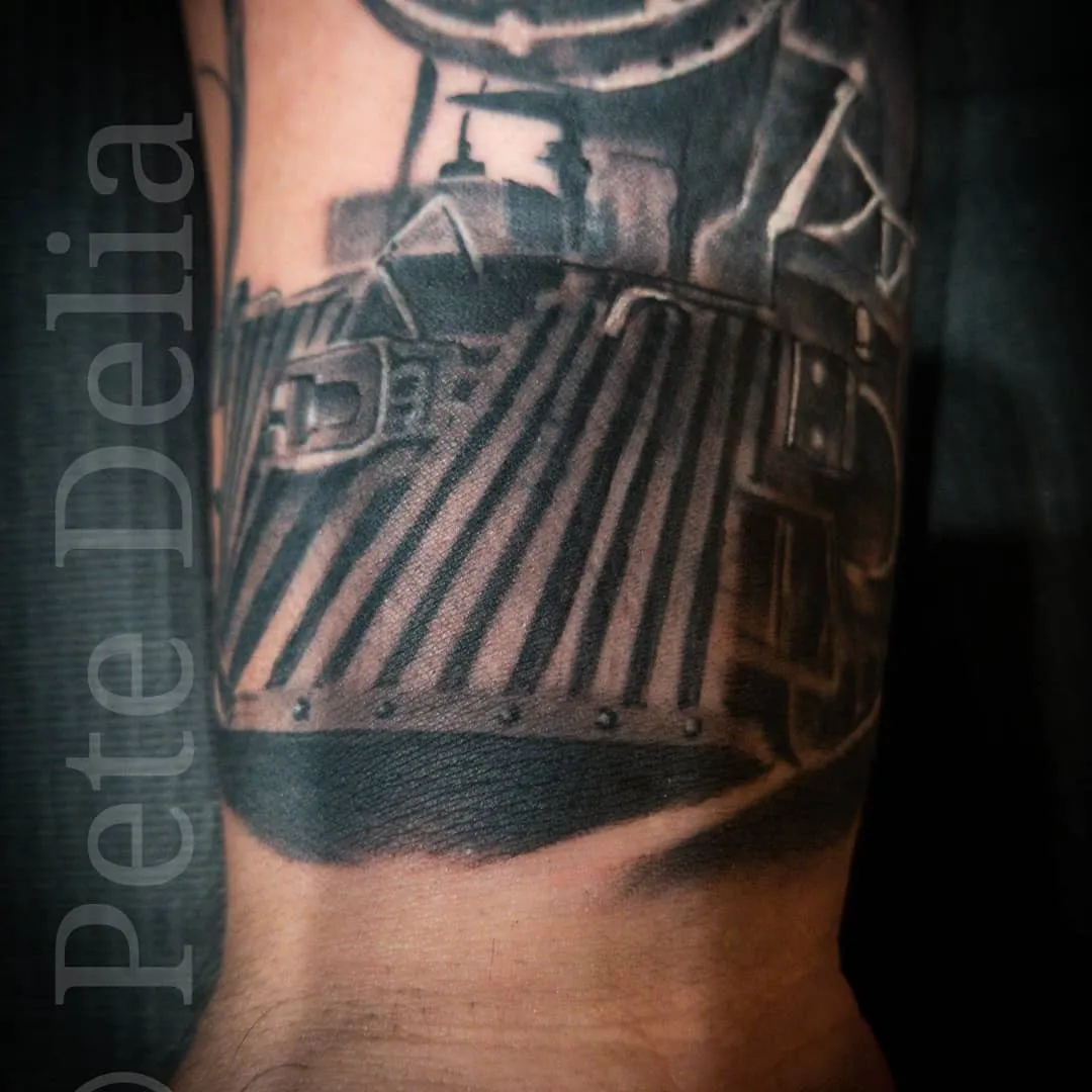 black & grey realism tattoo by Pete Delia at Fallen Raven Tattoo Studio in Simpsonville, SC
