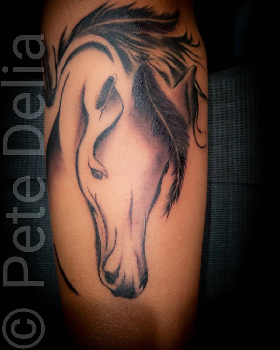 black & grey realism tattoo by Pete Delia at Fallen Raven Tattoo Studio in Simpsonville, SC
