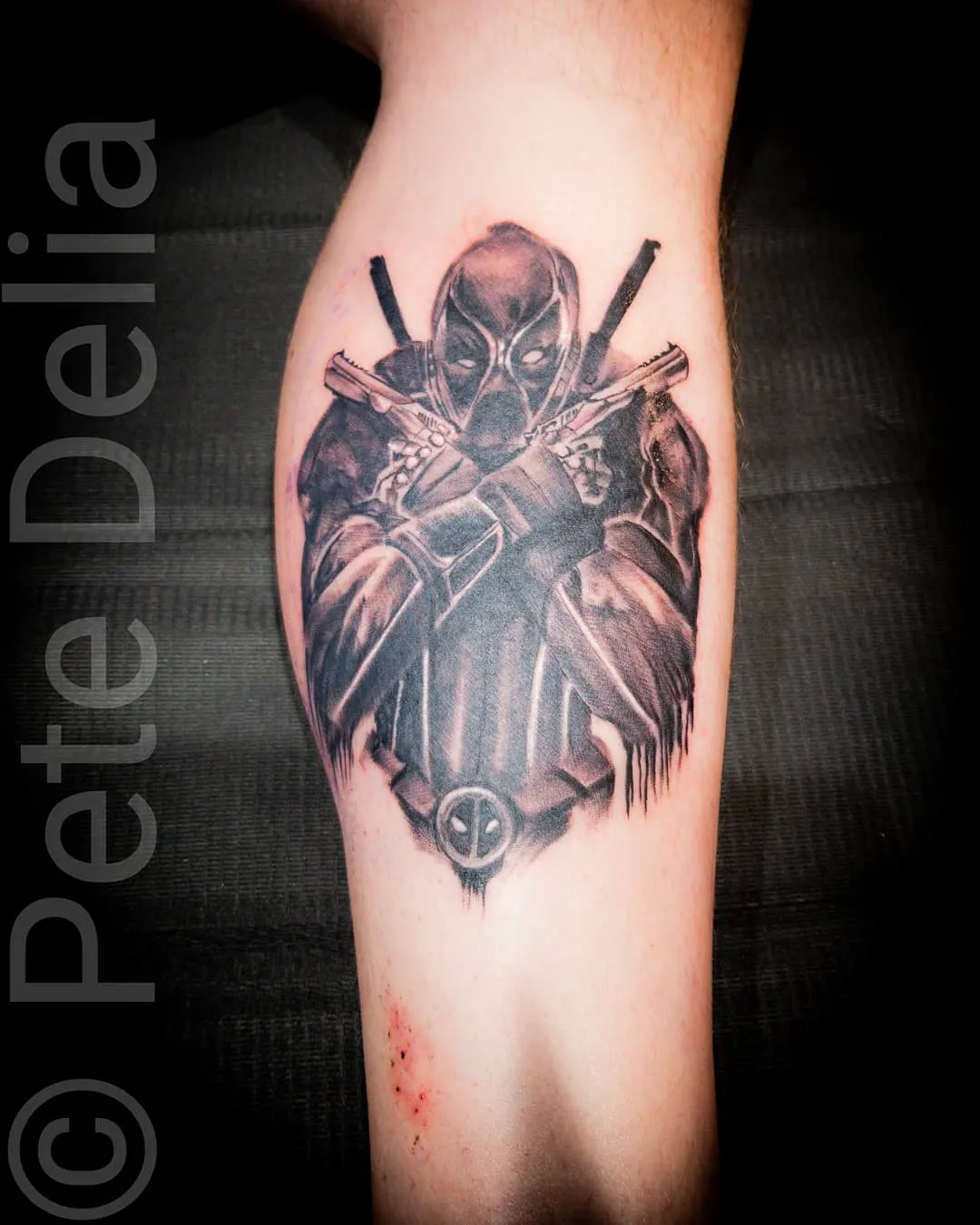 black & grey realism tattoo by Pete Delia at Fallen Raven Tattoo Studio in Simpsonville, SC