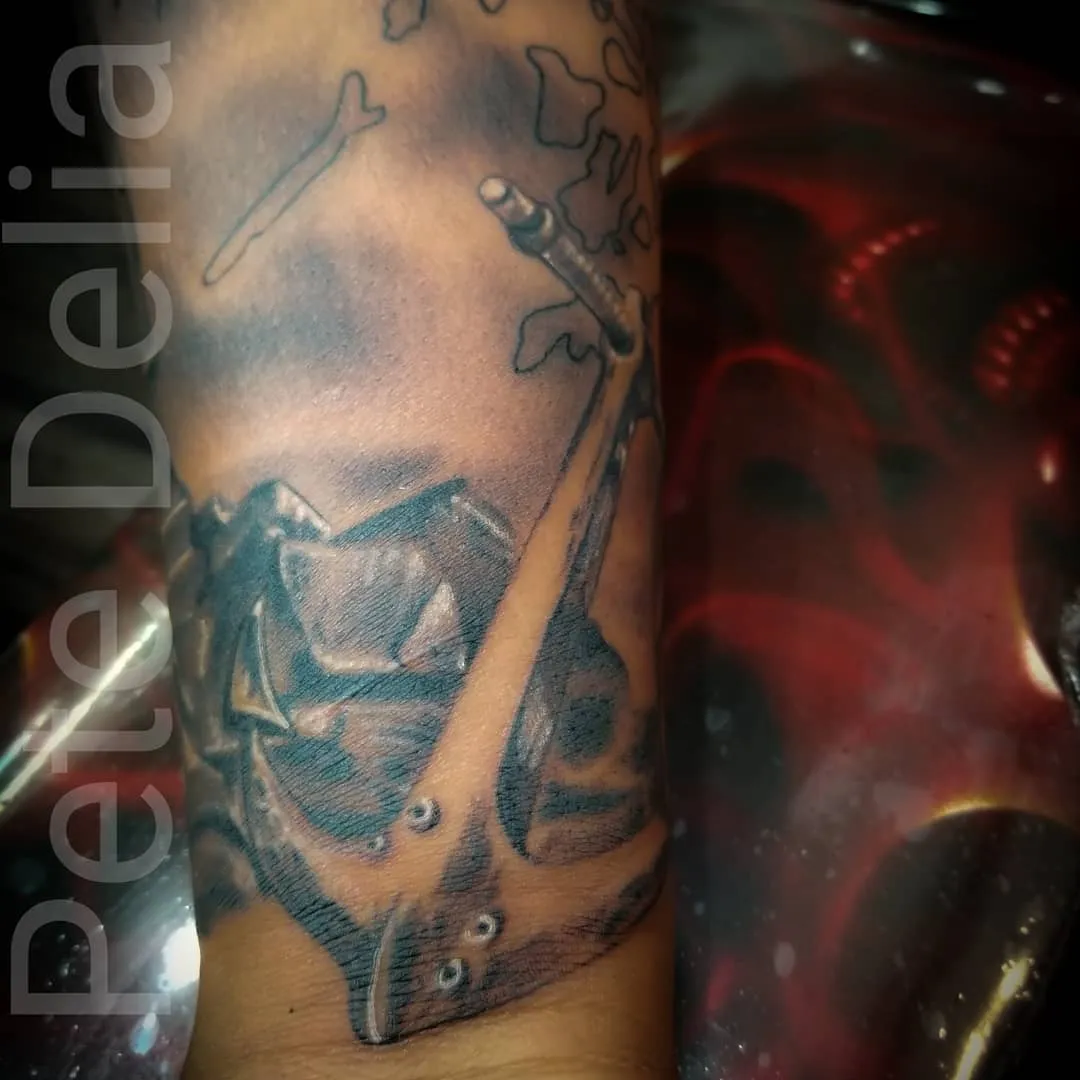 black & grey realism tattoo by Pete Delia at Fallen Raven Tattoo Studio in Simpsonville, SC