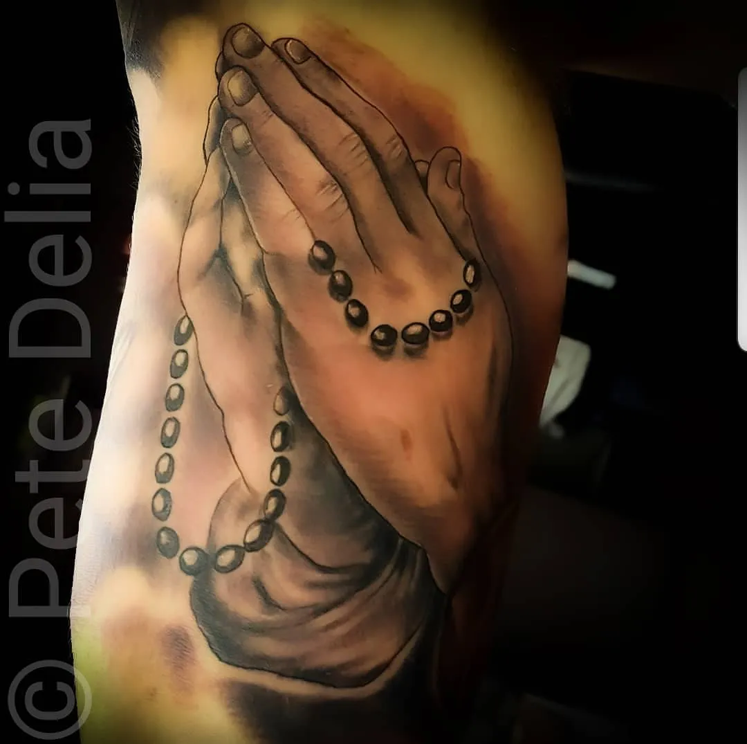 black & grey realism tattoo by Pete Delia at Fallen Raven Tattoo Studio in Simpsonville, SC