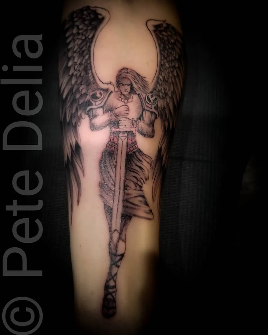 black & grey realism tattoo by Pete Delia at Fallen Raven Tattoo Studio in Simpsonville, SC