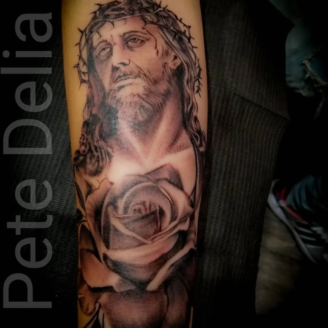 black & grey realism tattoo by Pete Delia at Fallen Raven Tattoo Studio in Simpsonville, SC