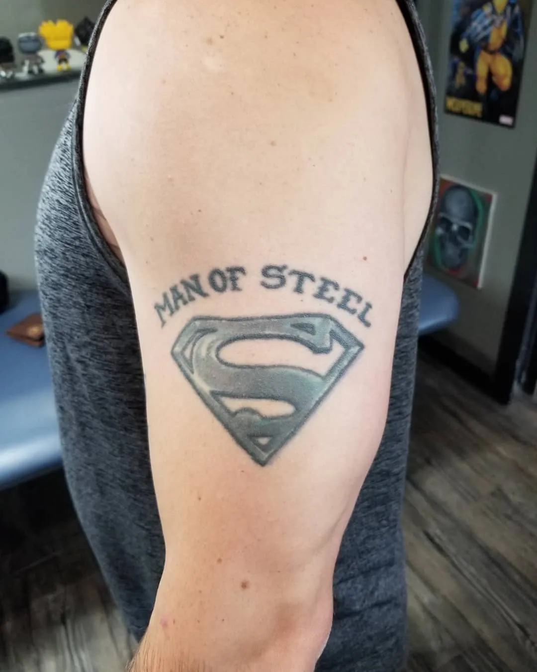 black & grey realism tattoo by Pete Delia at Fallen Raven Tattoo Studio in Simpsonville, SC