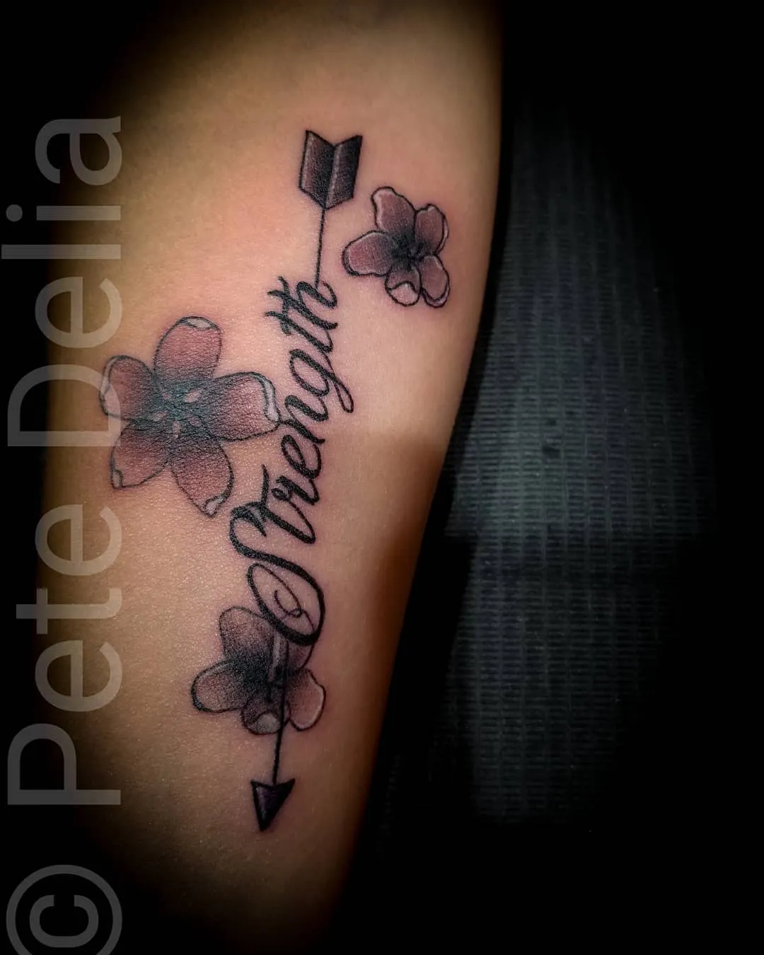 black & grey realism tattoo by Pete Delia at Fallen Raven Tattoo Studio in Simpsonville, SC
