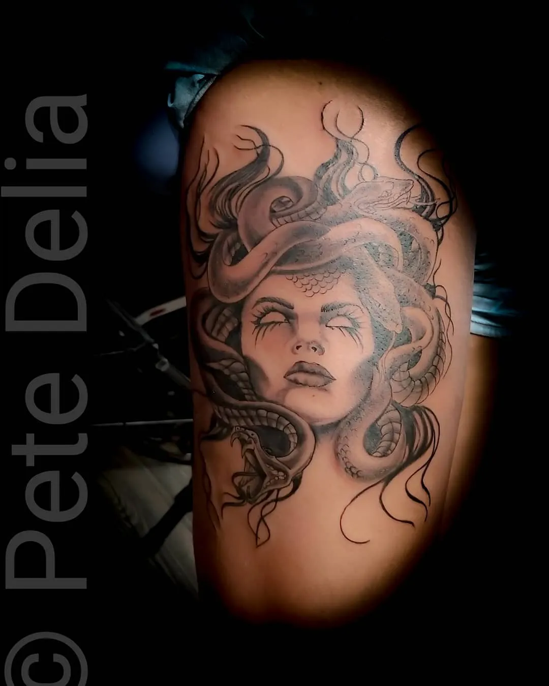black & grey realism tattoo by Pete Delia at Fallen Raven Tattoo Studio in Simpsonville, SC