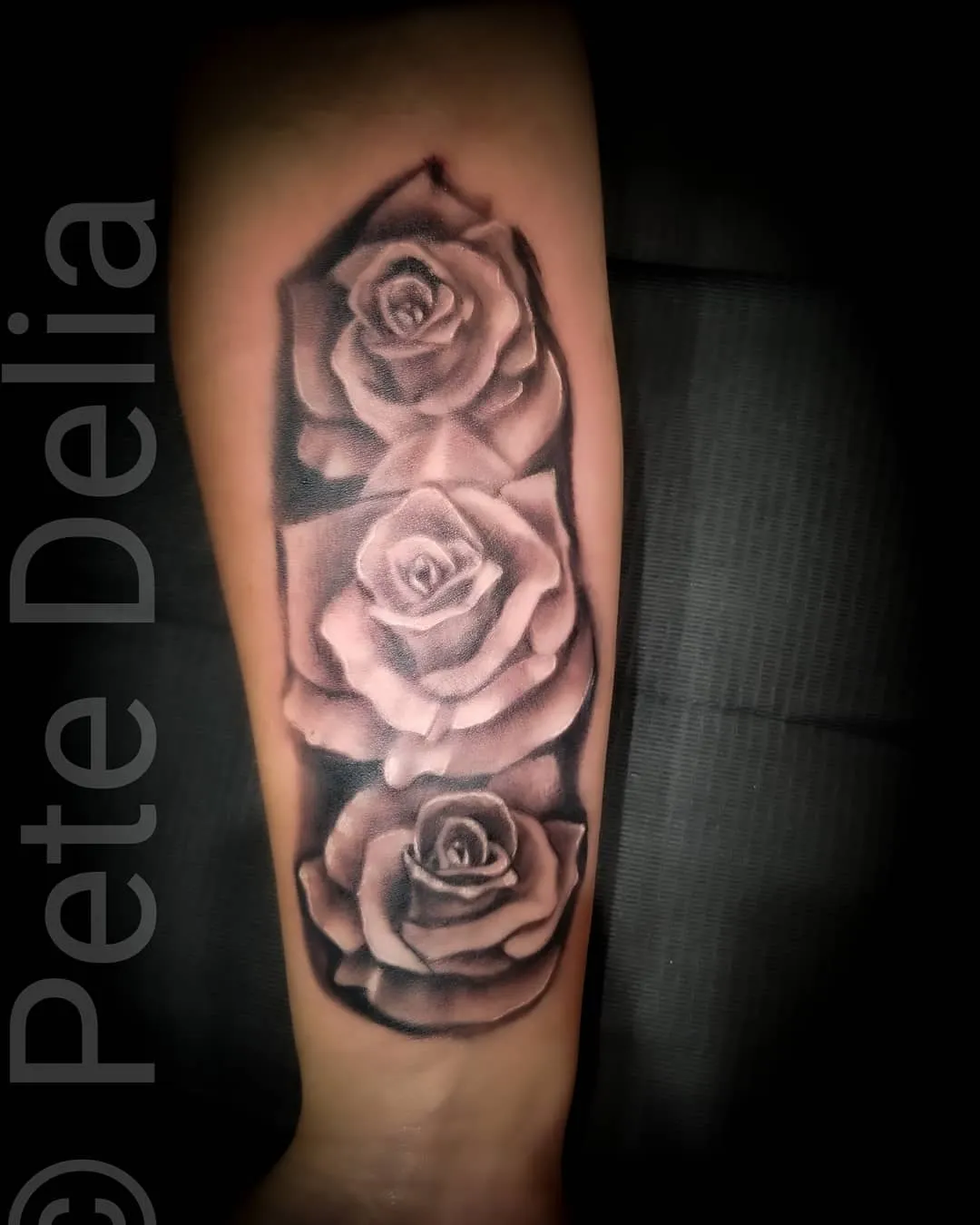 black & grey realism tattoo by Pete Delia at Fallen Raven Tattoo Studio in Simpsonville, SC