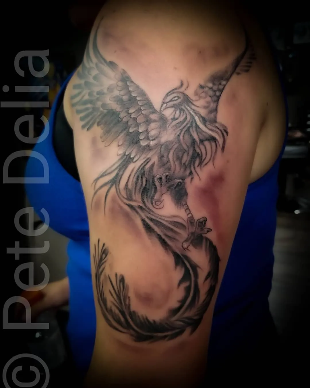 black & grey realism tattoo by Pete Delia at Fallen Raven Tattoo Studio in Simpsonville, SC
