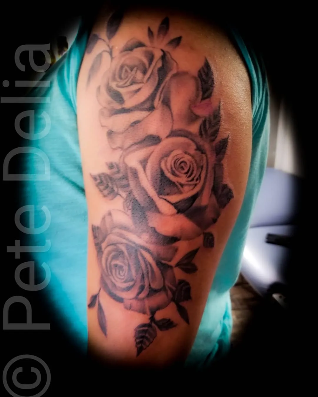 black & grey realism tattoo by Pete Delia at Fallen Raven Tattoo Studio in Simpsonville, SC