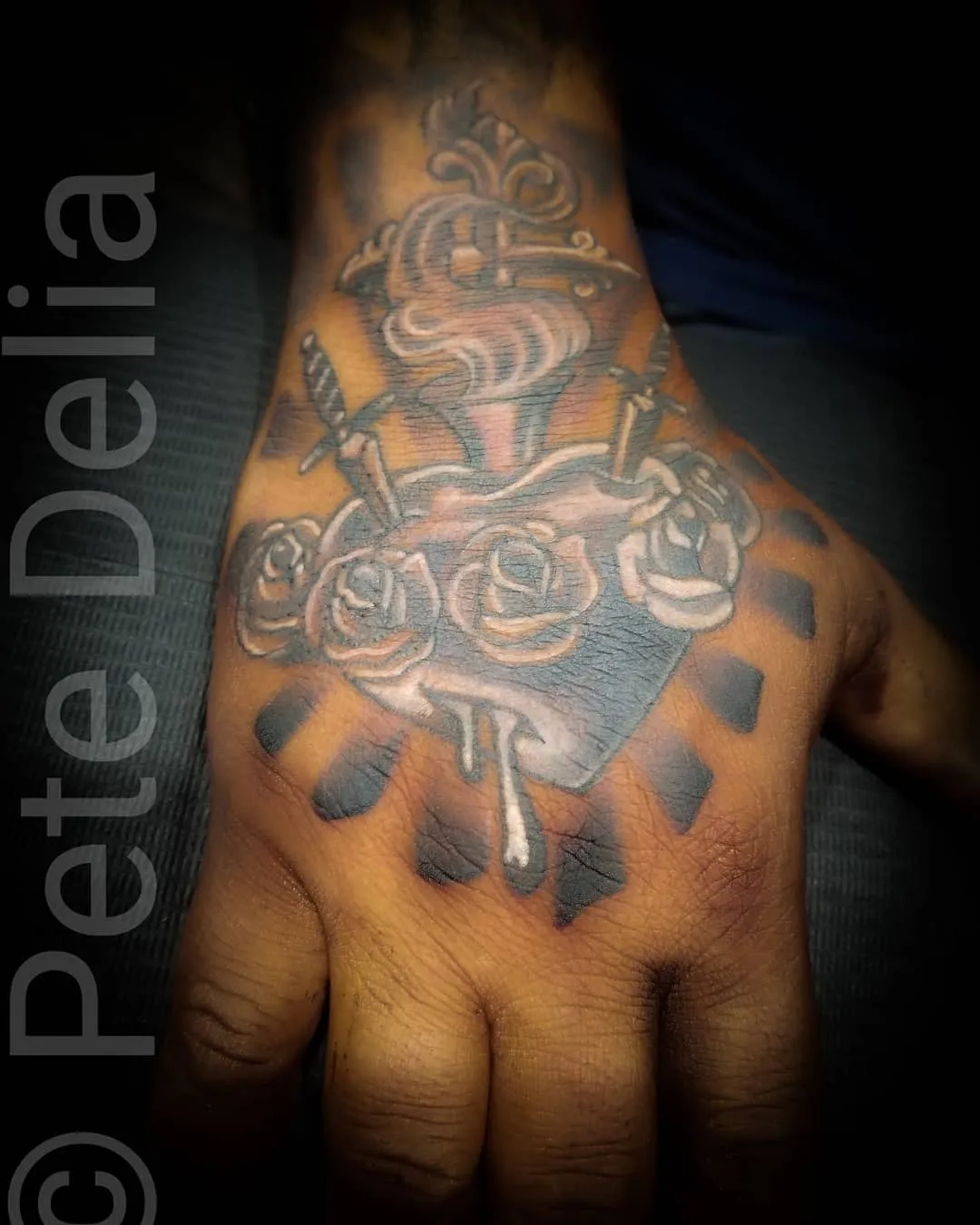 black & grey realism tattoo by Pete Delia at Fallen Raven Tattoo Studio in Simpsonville, SC