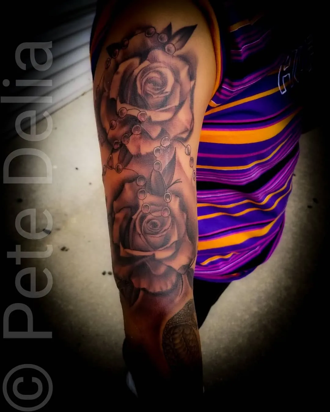 black & grey realism tattoo by Pete Delia at Fallen Raven Tattoo Studio in Simpsonville, SC