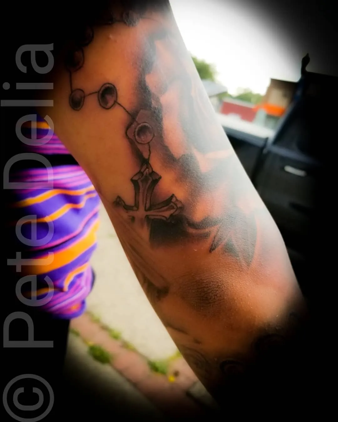 black & grey realism tattoo by Pete Delia at Fallen Raven Tattoo Studio in Simpsonville, SC