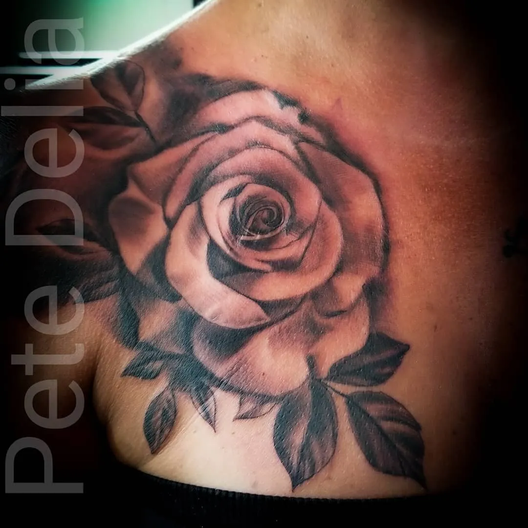 black & grey realism tattoo by Pete Delia at Fallen Raven Tattoo Studio in Simpsonville, SC
