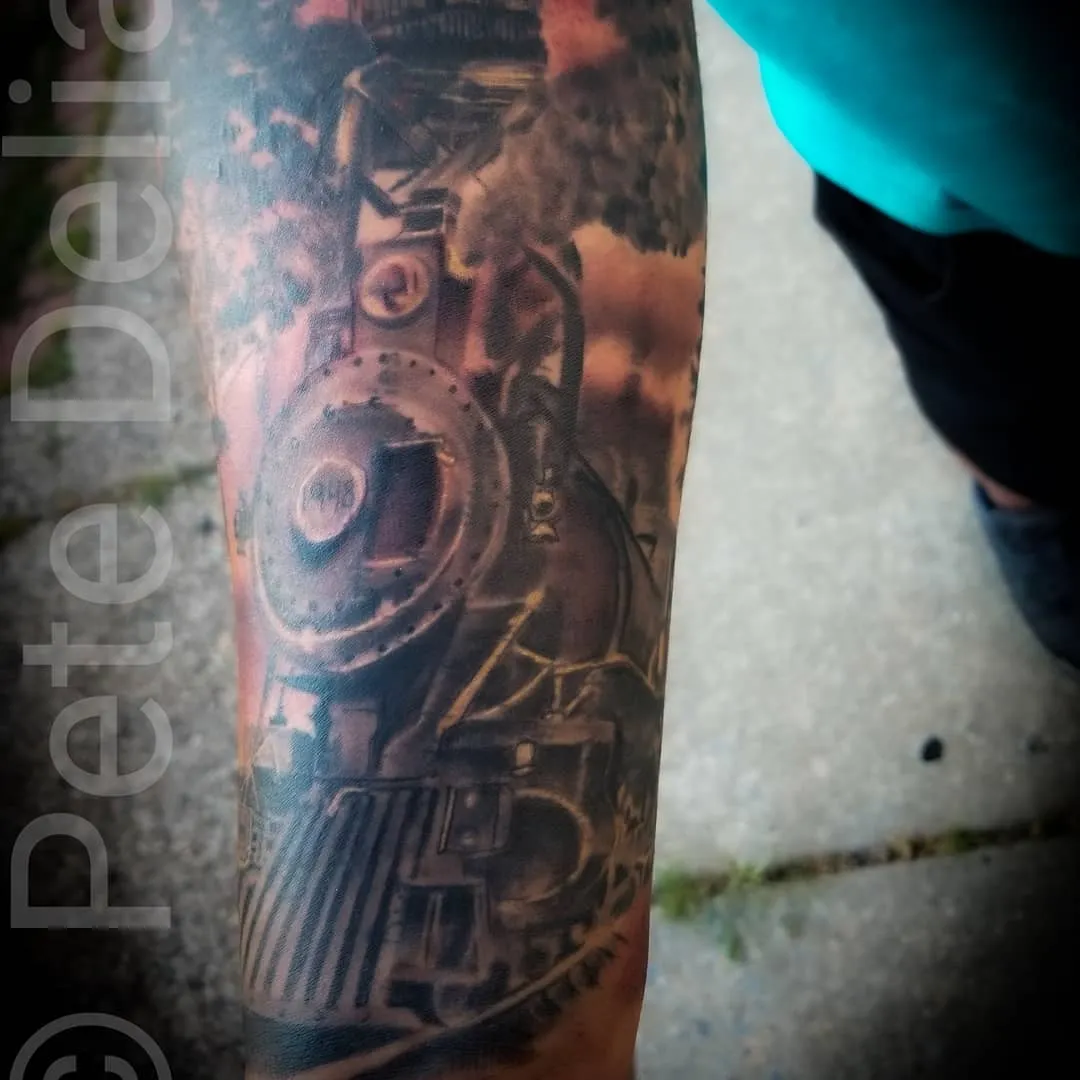 black & grey realism tattoo by Pete Delia at Fallen Raven Tattoo Studio in Simpsonville, SC
