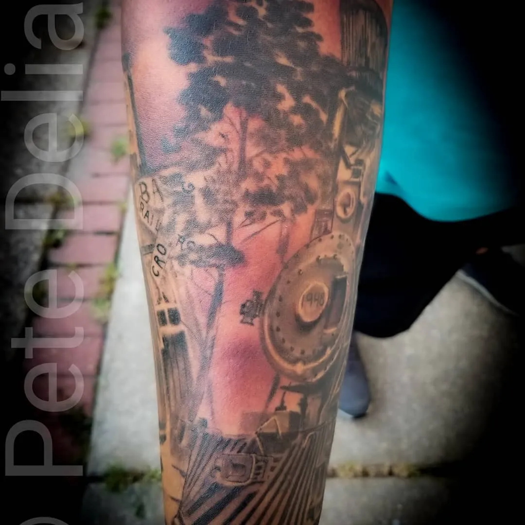 black & grey realism tattoo by Pete Delia at Fallen Raven Tattoo Studio in Simpsonville, SC