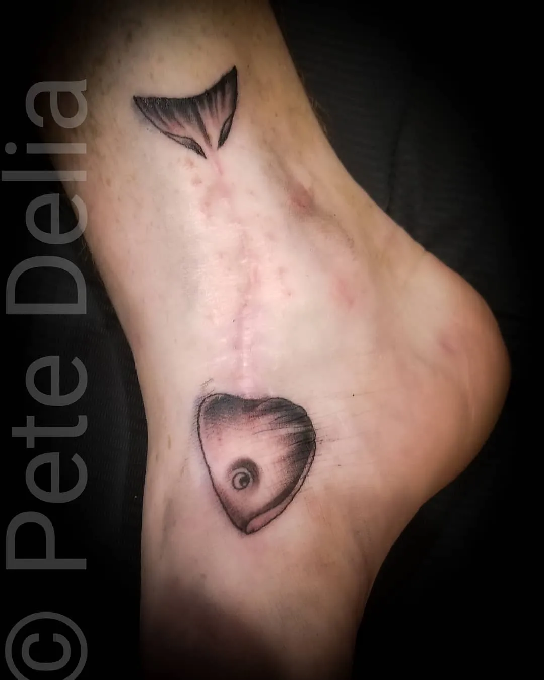 black & grey realism tattoo by Pete Delia at Fallen Raven Tattoo Studio in Simpsonville, SC