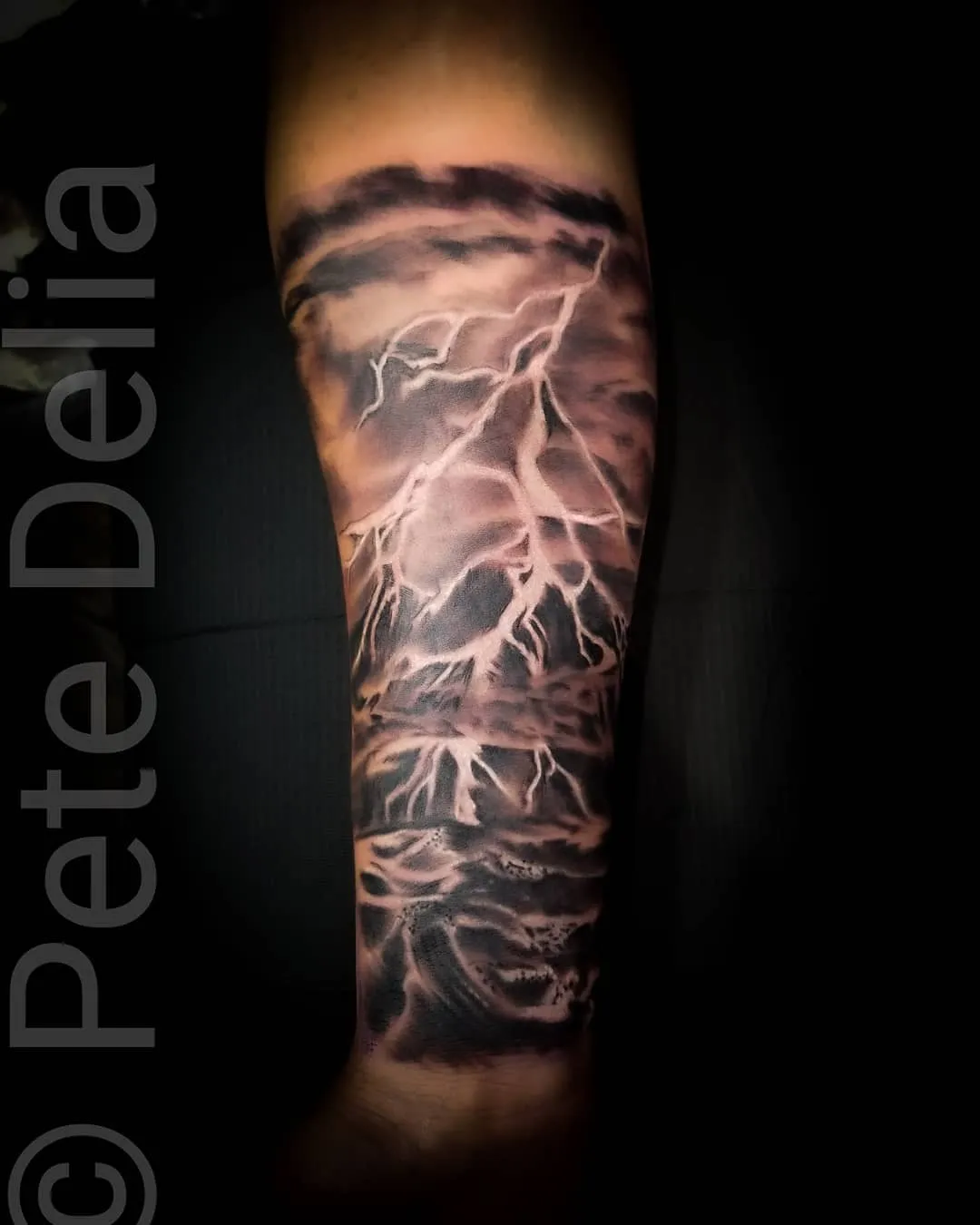black & grey realism tattoo by Pete Delia at Fallen Raven Tattoo Studio in Simpsonville, SC