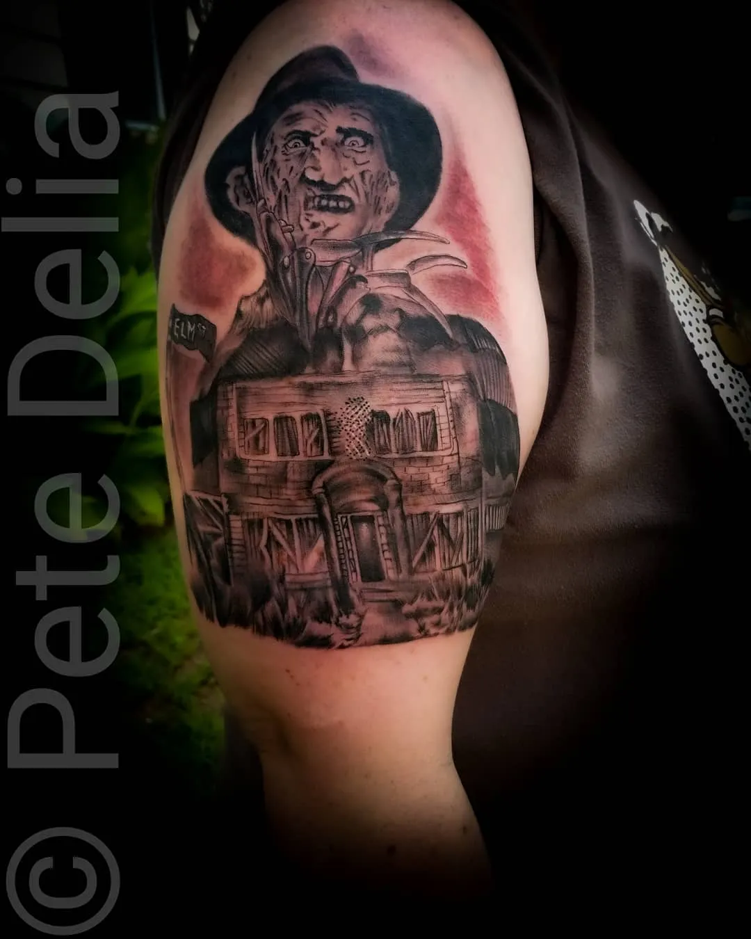 black & grey realism tattoo by Pete Delia at Fallen Raven Tattoo Studio in Simpsonville, SC