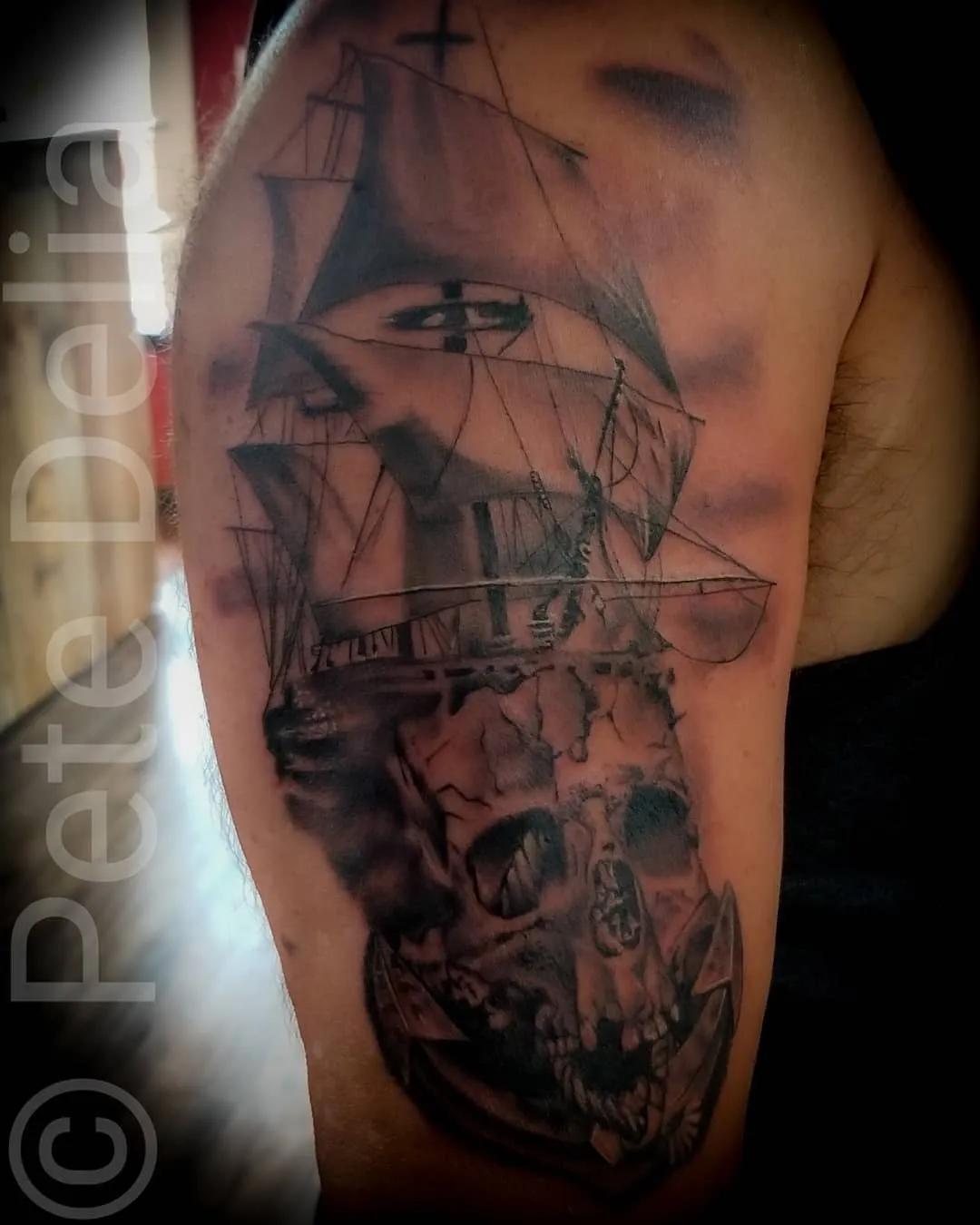black & grey realism tattoo by Pete Delia at Fallen Raven Tattoo Studio in Simpsonville, SC