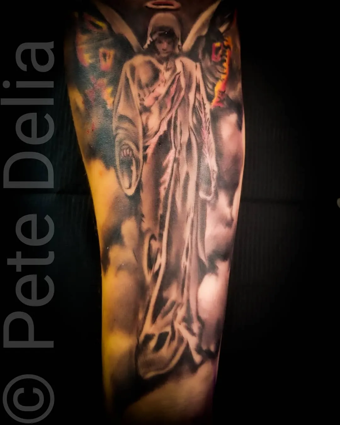 black & grey realism tattoo by Pete Delia at Fallen Raven Tattoo Studio in Simpsonville, SC