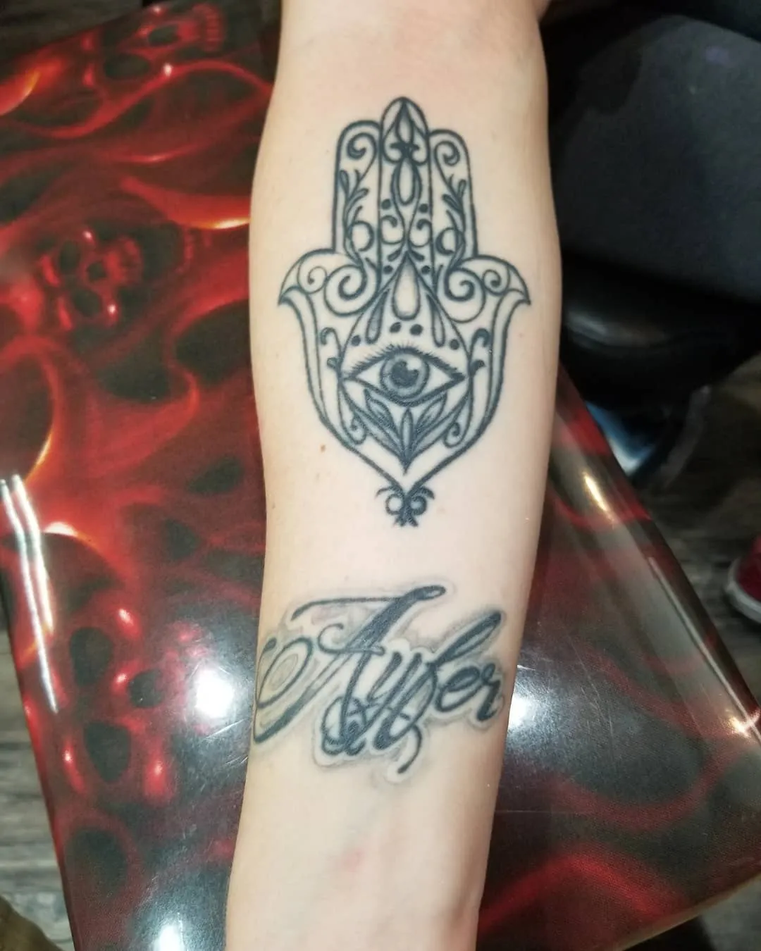 black & grey realism tattoo by Pete Delia at Fallen Raven Tattoo Studio in Simpsonville, SC