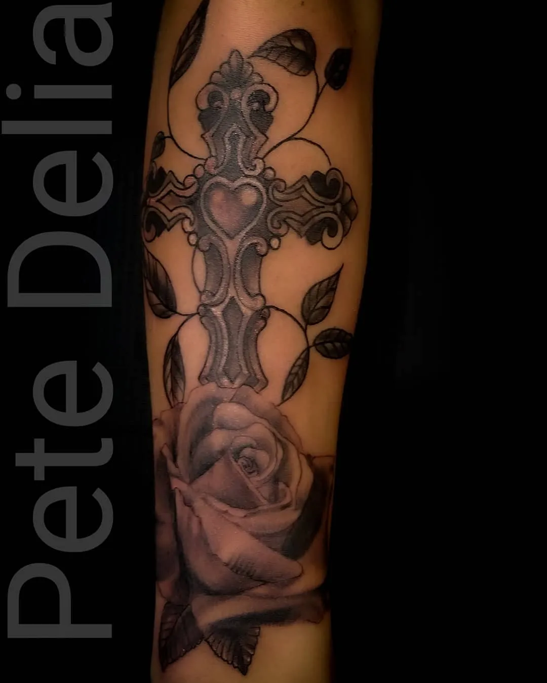 black & grey realism tattoo by Pete Delia at Fallen Raven Tattoo Studio in Simpsonville, SC