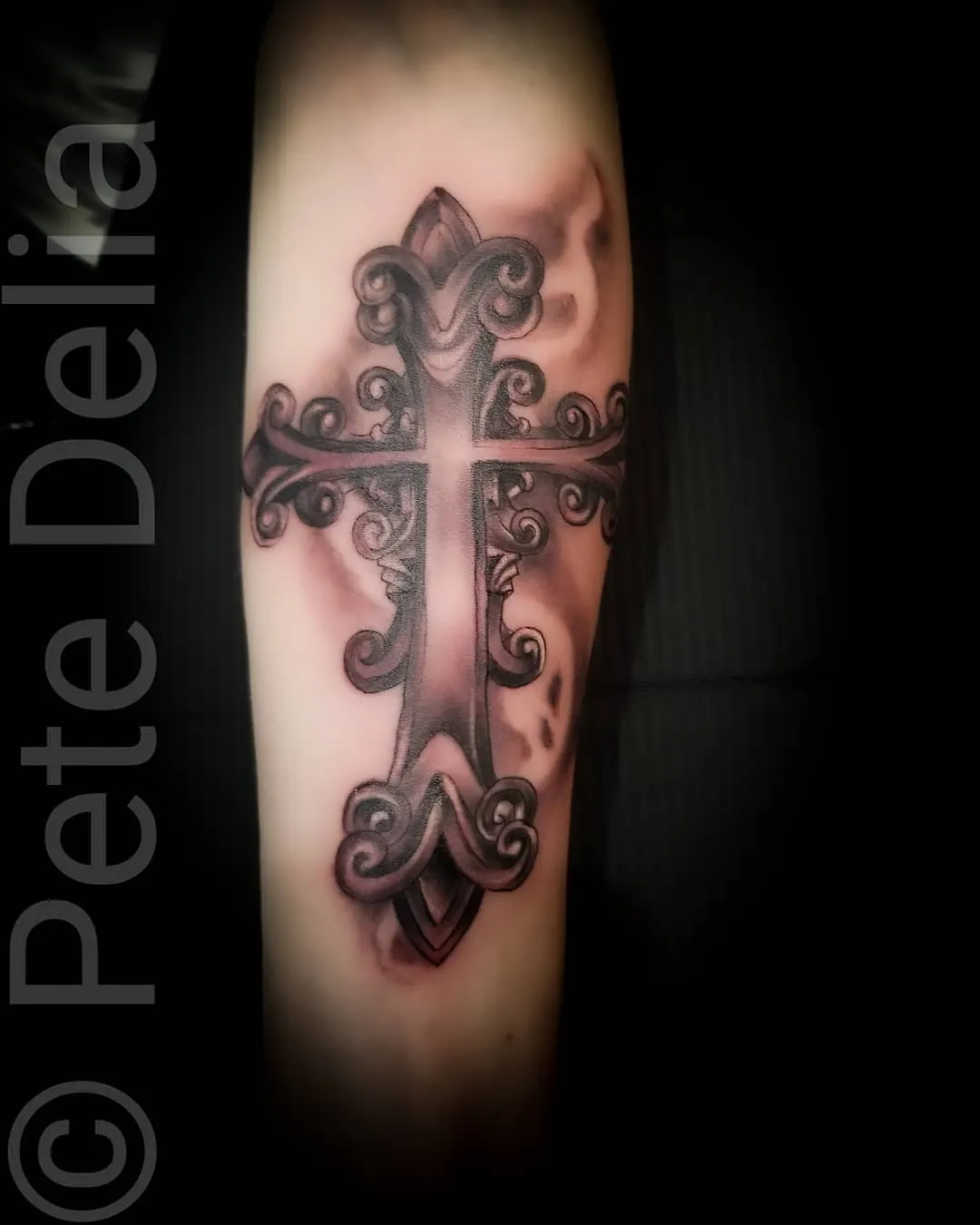 black & grey realism tattoo by Pete Delia at Fallen Raven Tattoo Studio in Simpsonville, SC