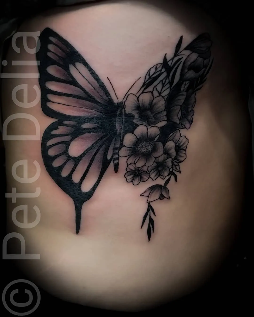 black & grey realism tattoo by Pete Delia at Fallen Raven Tattoo Studio in Simpsonville, SC