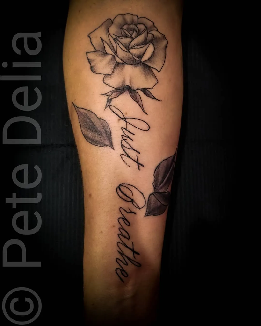 black & grey realism tattoo by Pete Delia at Fallen Raven Tattoo Studio in Simpsonville, SC